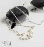 “Niveus” Eyewear Chain